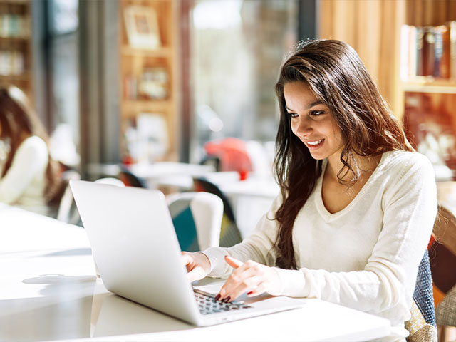 Two people reviewing Adobe content