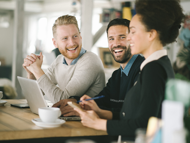 three young professionals collaborate as a skilled team