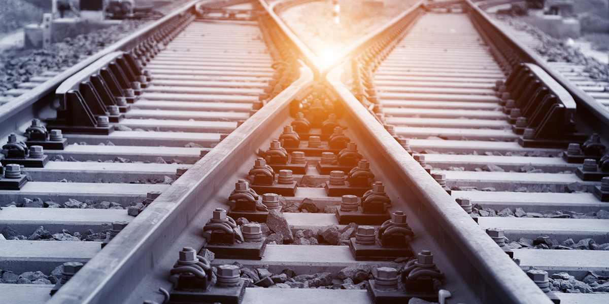 a close up of railroad tracks and the bots