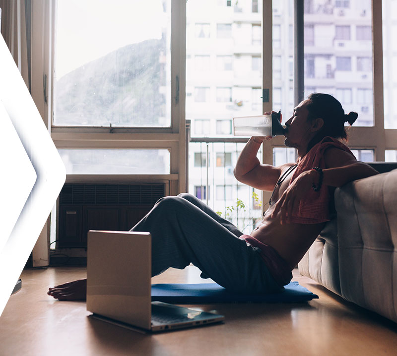 man relaxing while working digitally