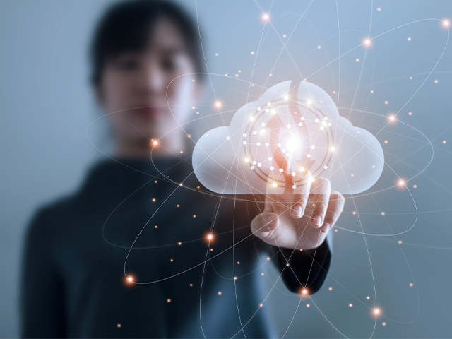 a woman touching the Google cloud