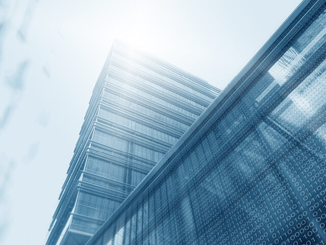 looking up at a building with numbers on it symbolizing cyber security