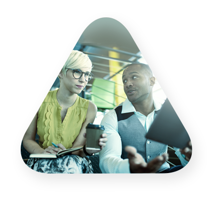 two young professionals review cloud services on tablet