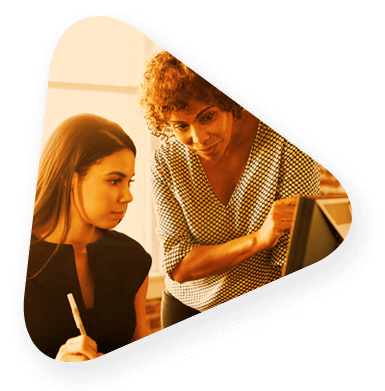 a teacher and a student reviewing an assignment
