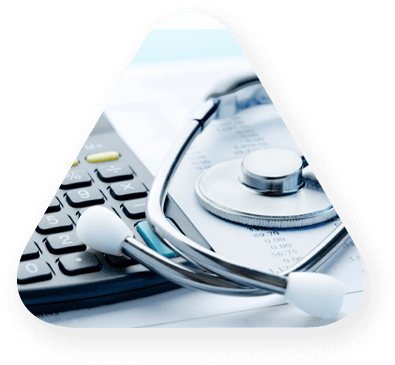 Calulator with stethoscope on desk