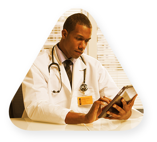 Doctor reviewing healthcare data and analytics on his tablet