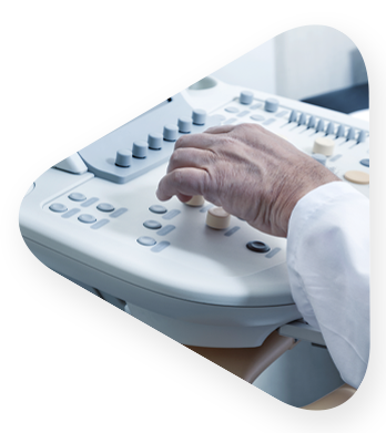 healthcare professional reviewing data on a medical system