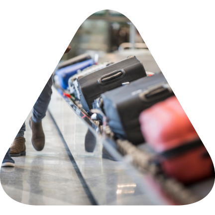Bags on an airport baggage claim conveyer belt