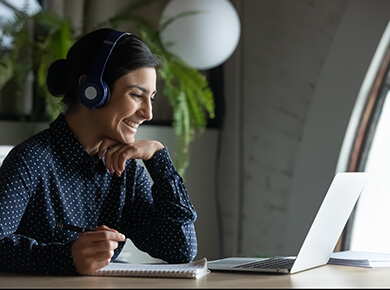 A remote worker in a blended workforce joins a call on her laptop