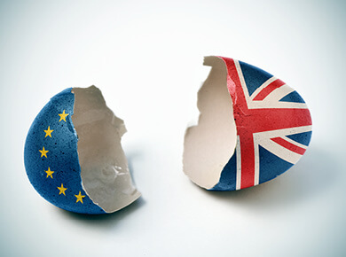 split egg shell with EU and UK flags