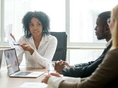 Woman leading a corporate meeting