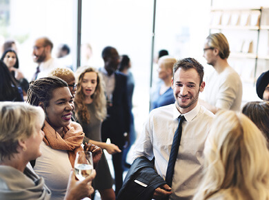 young modern professionals at networking event