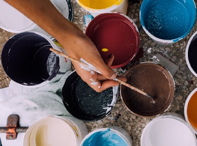 Paint cans filled with rich colors to "brand yourself"