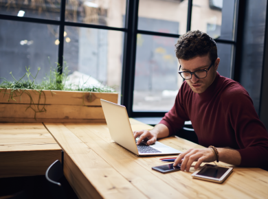 young professional submitting application and working on resumes kills