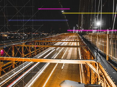 evening view of a bridge overlooking a city with a digital overlay