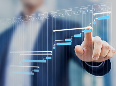 A person in the background leading a virtual team traces an overlay of a Gantt chart with his finger