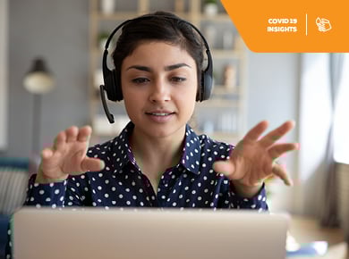female instructor conducting remote learning course on laptop