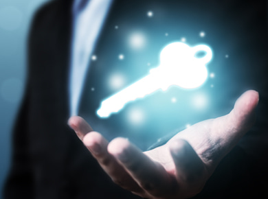 man reaching out with an open palm holding the key to mitigating organizational risk