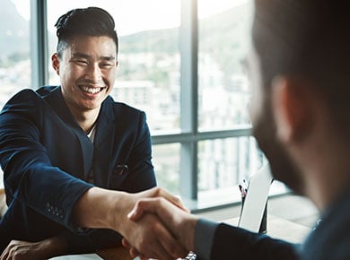Two businessmen shaking hands