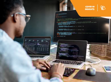 business profesional working via cloud connection on laptop