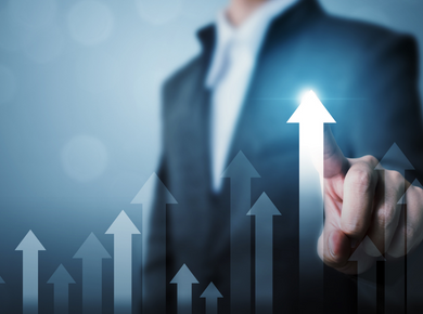 person pointing at graph arrow