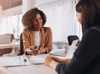 two women holding an interview