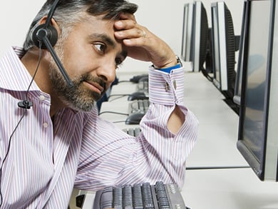 tired help desk worker