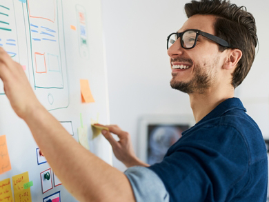 a UX designer whiteboards