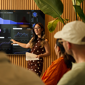 Marketing specialist presenting campaign performance insights to stakeholders during a creator marketing strategy session in Asia Pacific.