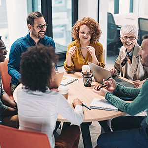 Technology professionals collaborating on site reliability engineering to improve cloud operations and enterprise resilience.