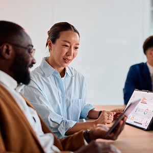 Technology specialists reviewing data insights for enterprise cloud platform operations
