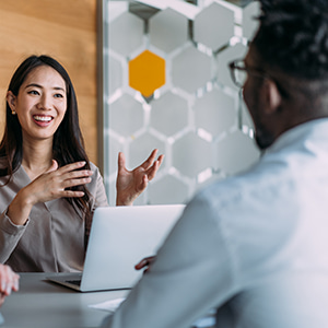 Professionals collaborating to modernise a global financial services distributor platform through user-centred design and digital transformation.
