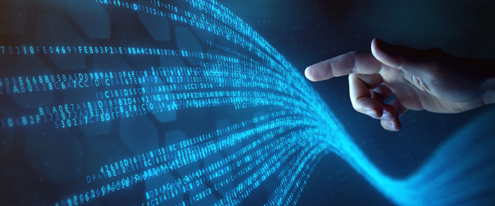 A hand pointing at a stream of glowing blue binary code and data flowing through a dark background