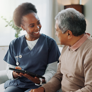 A medical professional is discussing a chart with the patient
