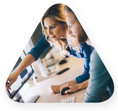 male and female analyst reviewing data dashboard