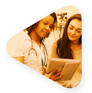 A patient and a nurse reviewing chart information