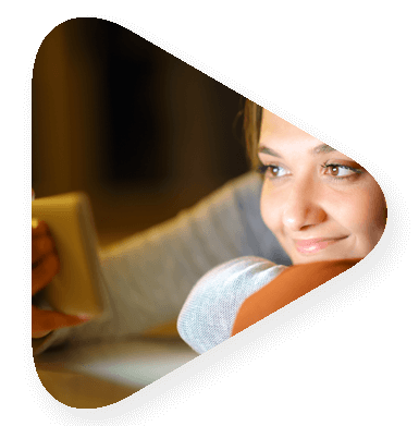 woman watching streamed media on mobile device