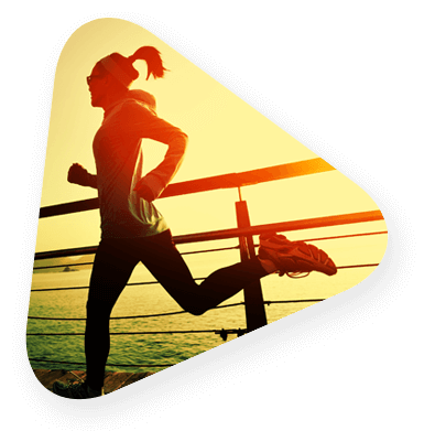 a woman enjoying the benefits of running on the boardwalk