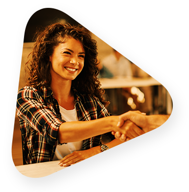 a woman shaking someones hand