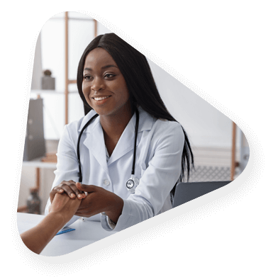 A doctor holding a patients hand