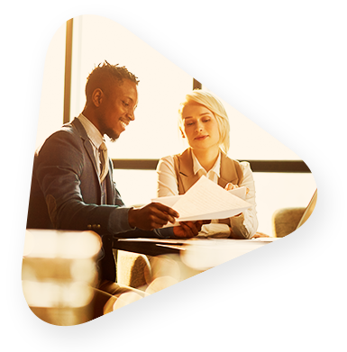 a man and a woman reviewing paperwork