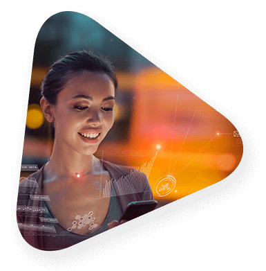 Woman looking down at screen with data interfaces and graphs expand off the screen