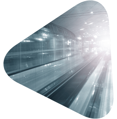 An airplane terminal with a light flashing across