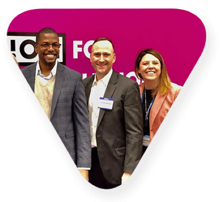 Image of three TEKsystems exeuctives cropped as a small triangle