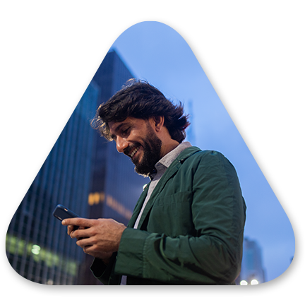 Man on his phone walking down the street