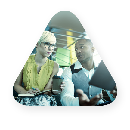 two young professionals review cloud services on tablet