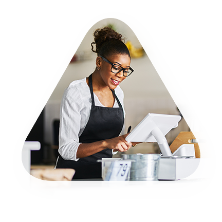 female fast-food employee uses new cloud based POS system