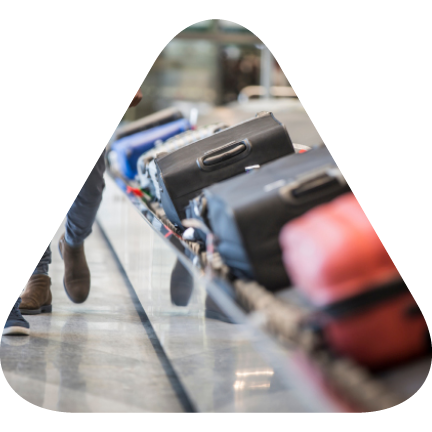 Bags on an airport baggage claim conveyer belt