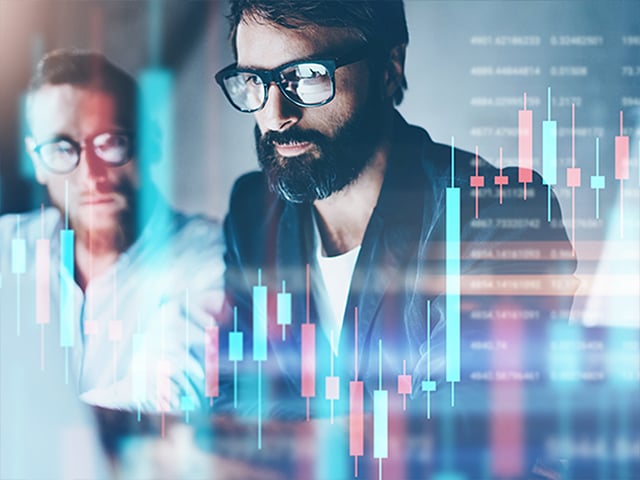 People reviewing Adobe data