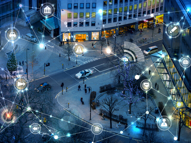City street outside large office buildings in winter with overlay containing business transformation icons networked